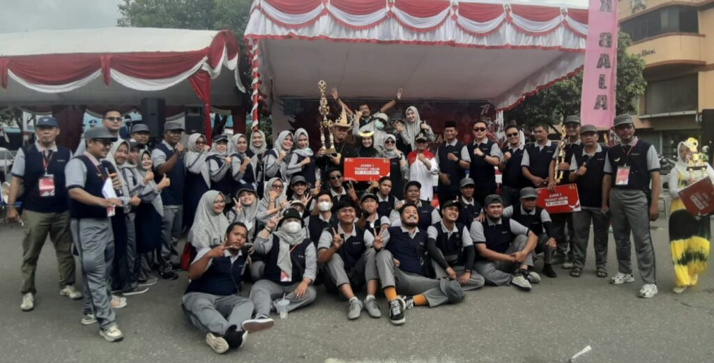 Budi Hartono Pimpin Pengamanan Pawai Pembangunan Tingkat Kecamatan Lubuk Baja