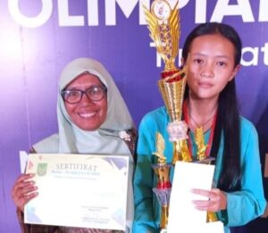 Dari Belakang Padang ke Panggung Prestasi! Jocelyn Siswa SMPN 1 Batam Raih Juara II Olimpiade Sains Batam 2025