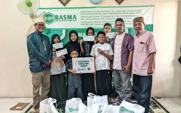 Tak Hanya Urus Olahraga, SIWO PWI Pusat Turun Berbagi untuk Yatim dan Disabilitas
