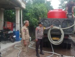 Hari ke-75, Polsek Batu Ampar Konsisten Salurkan Air Bersih ke Warga Terdampak