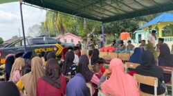 Polwan Polresta Barelang Berbagi Bingkisan untuk Anak Yatim di Kampung Belongkeng